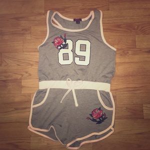 A grey rose romper